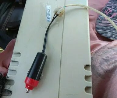 Через прикуриватель