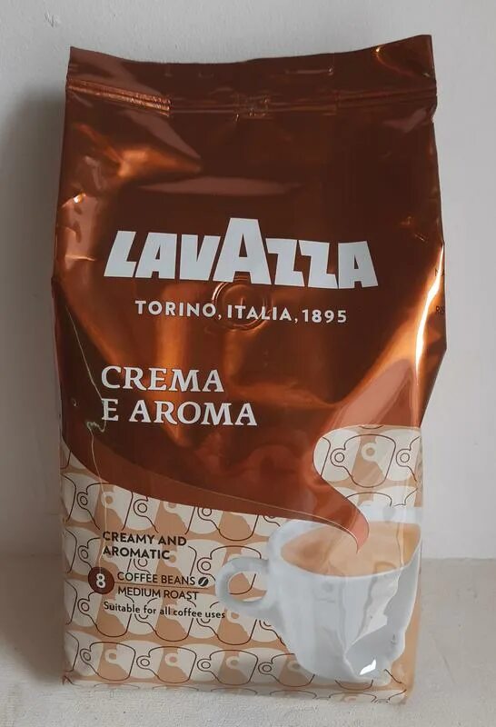 Кофе lavazza crema e aroma. Lavazza crema e Aroma оригинал. Кофе "Lavazza" crema e Aroma 1кг Италия. Lavazza crema Aroma 1 кг упаковка оригинальная. Кофе в зернах Lavazza crema e Aroma.