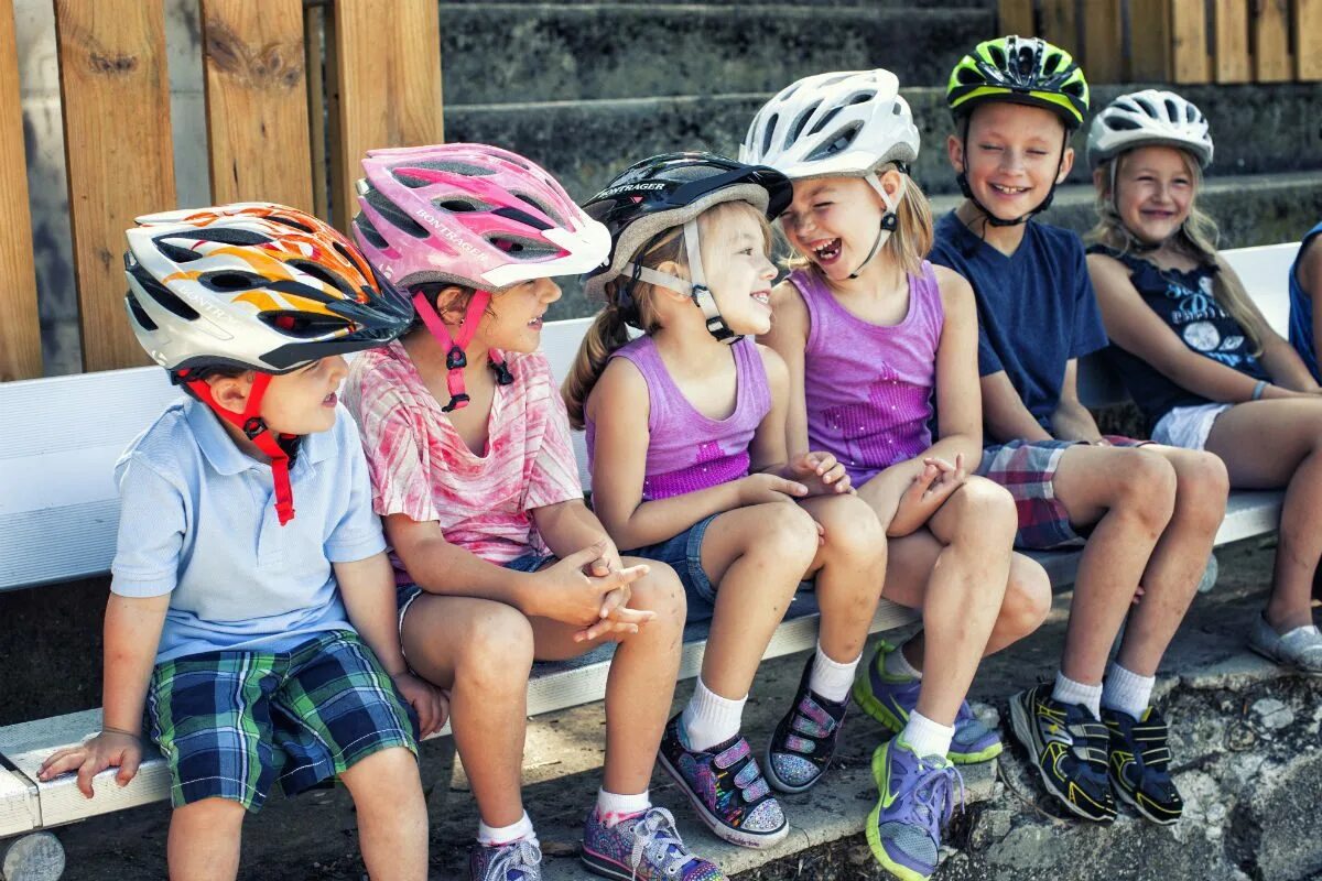 Children's Cycling Helmets. Kid is wearing a Helmet. Wear helmets