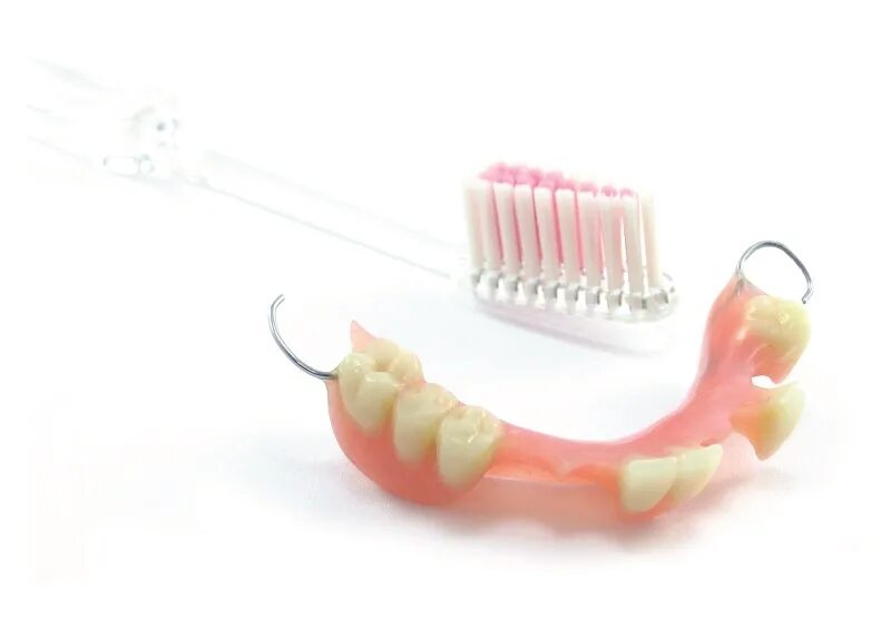 Снимать ли зубные протезы на ночь. Зубная щетка Вайнберг для зубных протезов. Щетка для съемных зубных протезов. Съемные щетки для зубов. Съемный протез в полости рта.