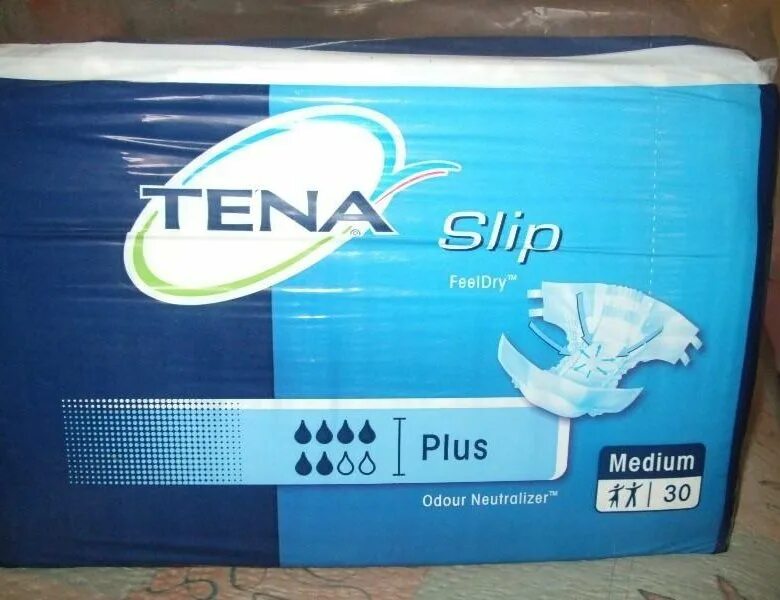 Подгузники для взрослых Tena Slip Plus. Подгузники Tena Basic Slip Medium 7322540380019. Подгузники Тена слип плюс Медиум. Взрослые в памперсах и подгузники.