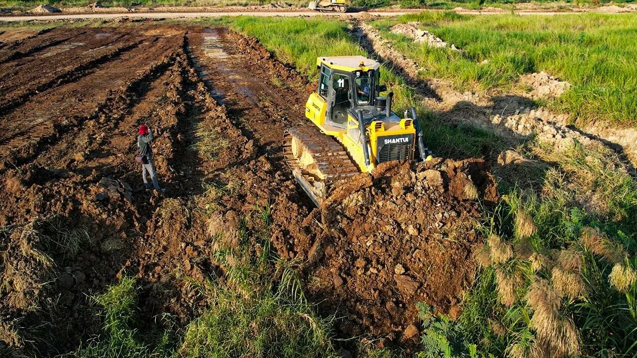 Clearing land. Clearing wooded Land with Anchor Chain and Bulldozer. The Bulldozer is clearing gif.