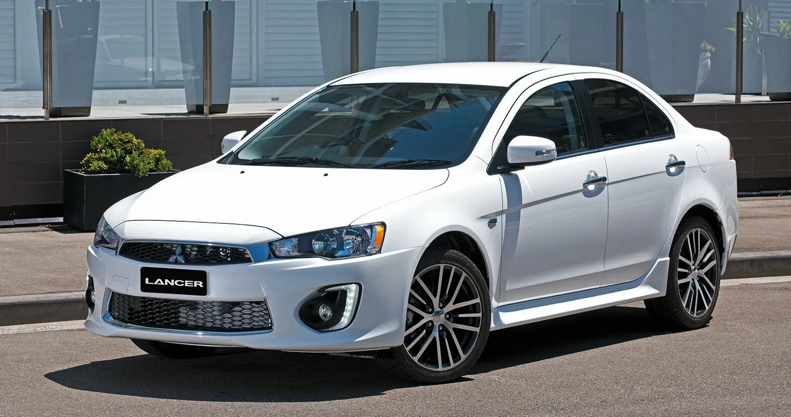 Митсубиси рестайлинг. Mitsubishi lancer 2016. мицубиси лансер 2016. митсубиси ланцер 2016. mitsubishi lancer x 2016.
