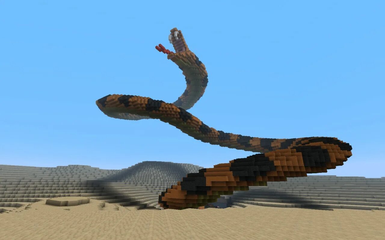 Статуя змеи майнкрафт. Змея постройка. Змея в МАЙНКРАФТЕ постройка. Змейка из МАЙНКРАФТА.