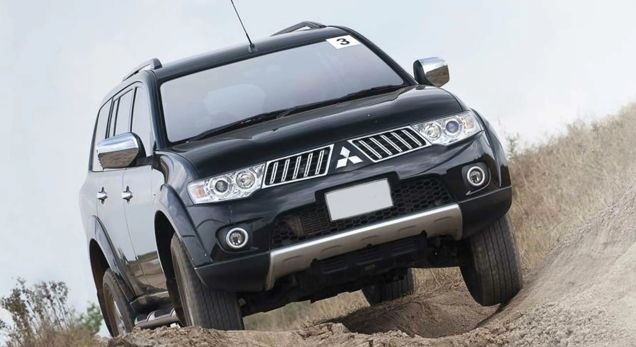 Мицубиси паджеро спорт 2011. Mitsubishi pajero sport. Mitsubishi pajero sport 2 красный. Митсубиси паджеро спорт 2. Mitsubishi montero 2 2000.