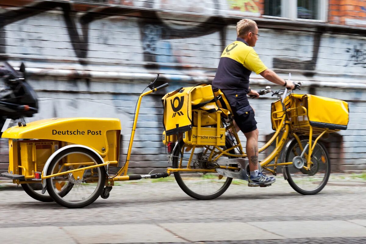 Post delivered. Карго байк DHL. Велосипед DHL. Велосипед Post Bike. Deutsche Post.