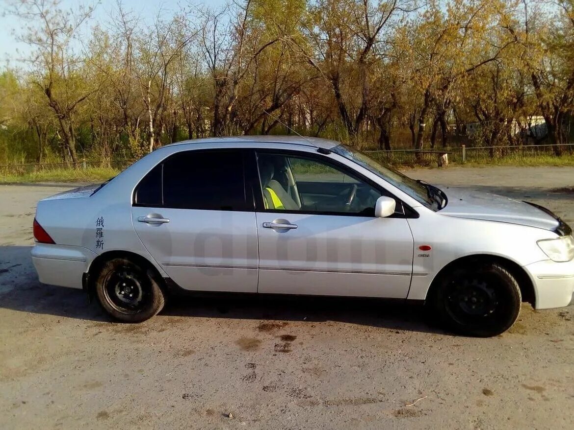 Лансер цедия 2001 седан чёрный. Mitsubishi lancer 9 cedia. Lancer cedia 2001. Митсубиси лансер 2001. Mitsubishi lancer ix 2001.