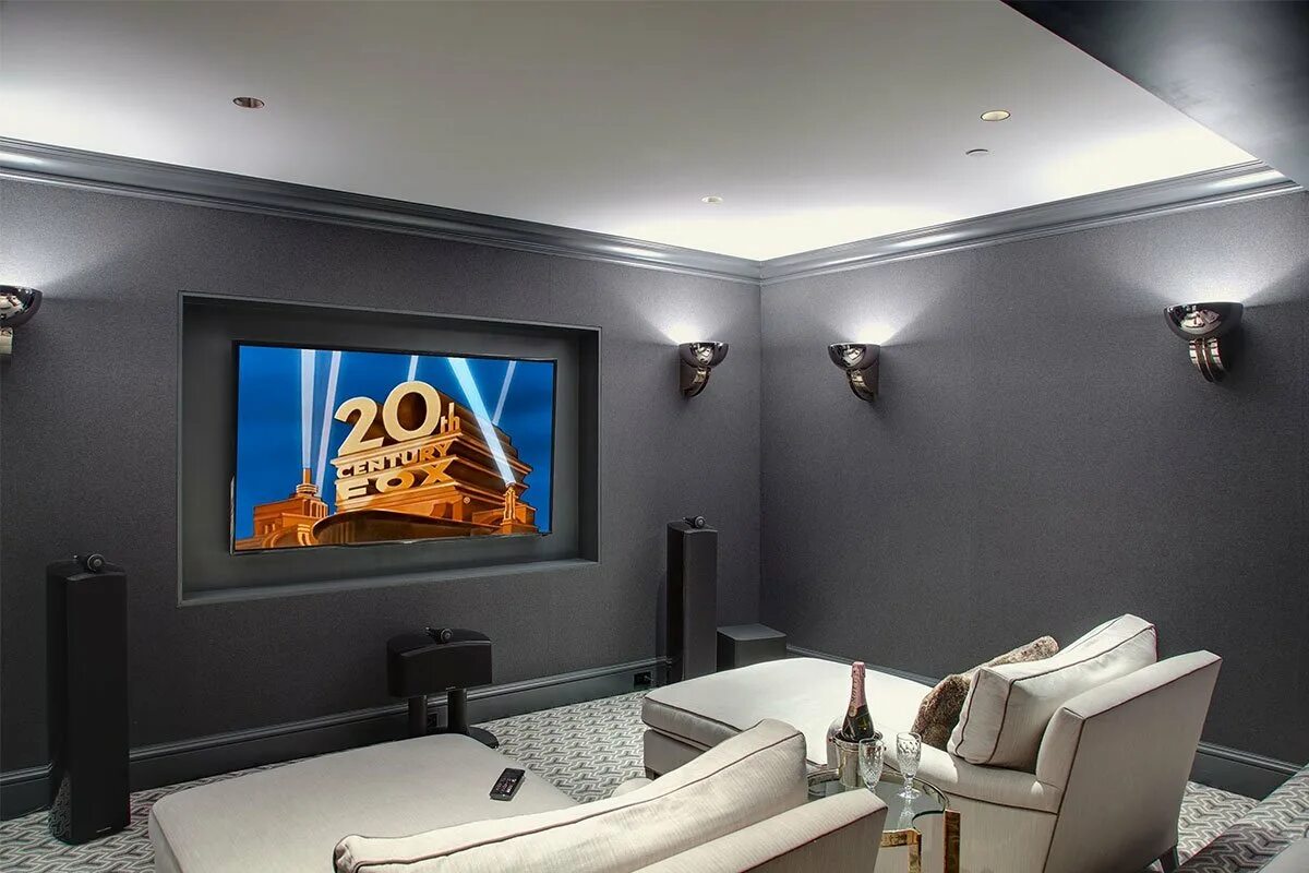 Комната с телевизором. Комната с телевизором на стене. Интерьер комнаты с телевизором на стене. Домашний кинотеатр на стене. Большой телевизор в квартире.