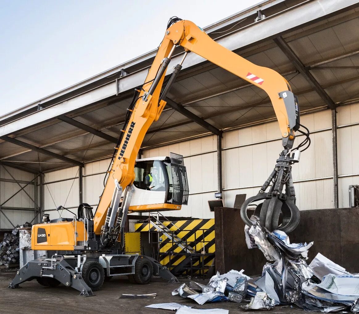 Перегружатель либхер. Liebherr lh30. погрузчик liebherr lh30 m litronic. перегружатель либхер lh30. погрузчик liebherr lh 30.