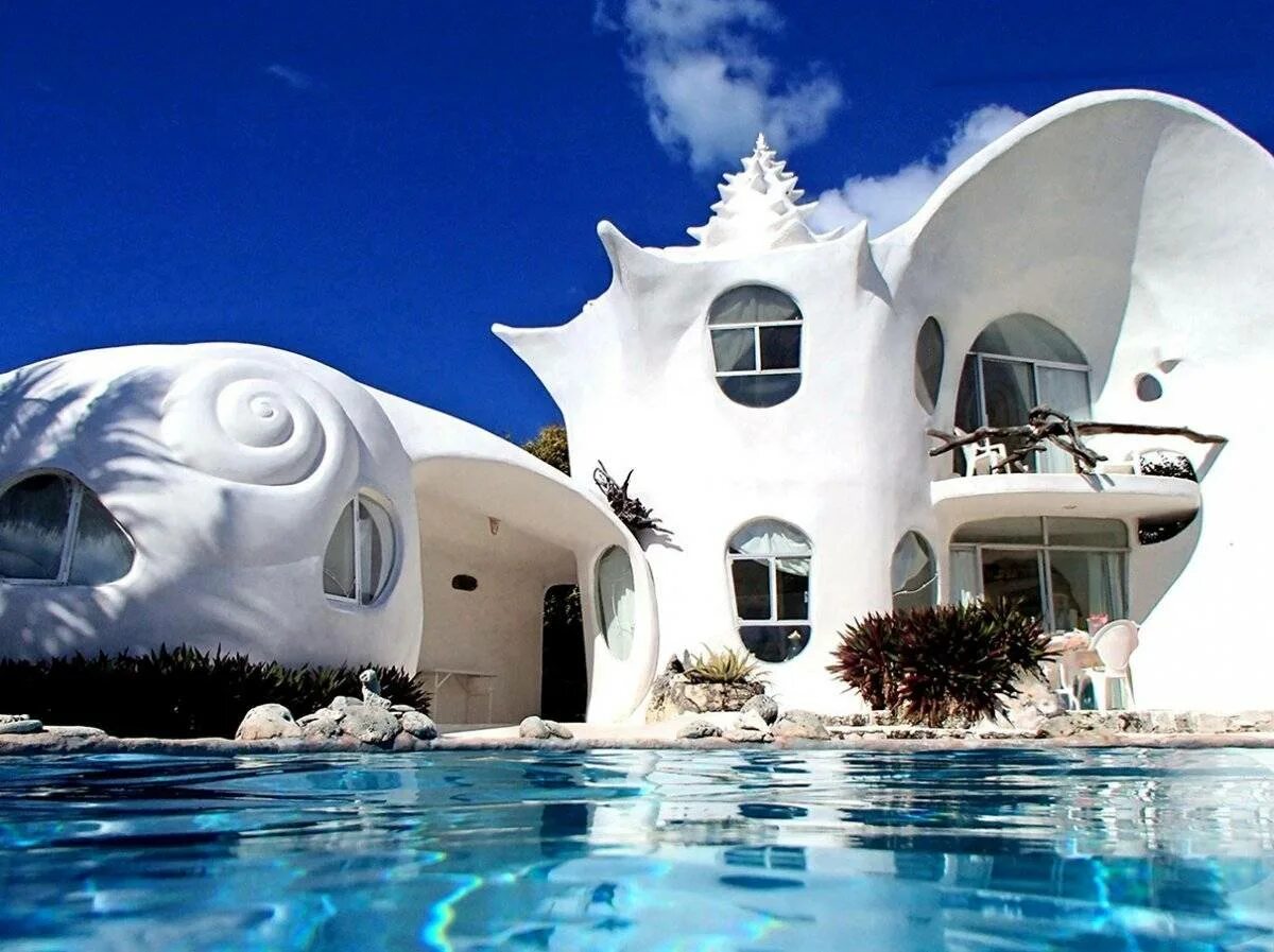 Включи дом мир. Исла Мухерес дом Ракушка. Conch Shell House (Исла-Мухерес, Мексика). Здание Ракушка Мексика. Conch Shell House (Мексика).