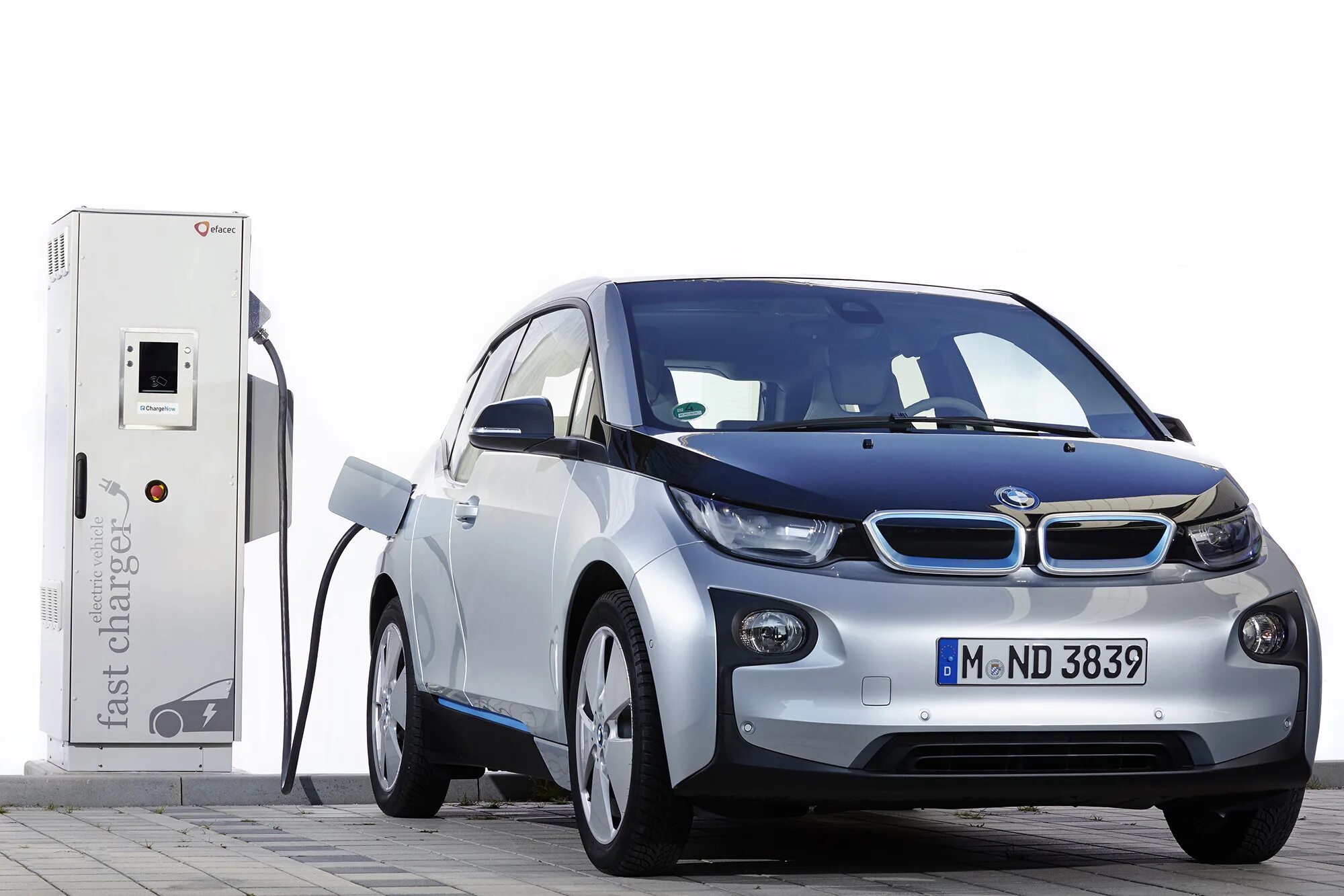 BMW i3 электромобиль седан. BMW i3 2025. BMW электрокар 2023. BMW i3 гибрид зарядка.