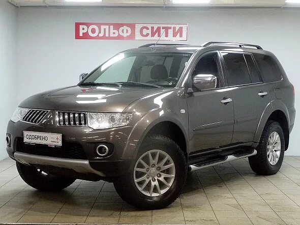 Mitsubishi pajero sport 2012. Мицубиси Паджеро спорт 2012. Паджеро спорт 2 2012. Mitsubishi Pajero Sport коричневый 2012. Паджеро спорт 2 дизель 2.5.