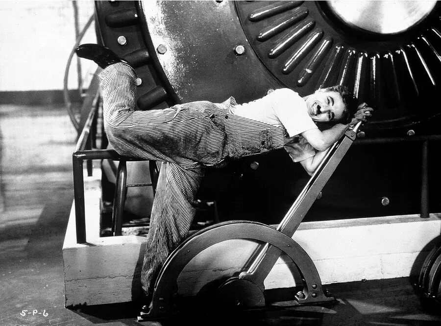Новые времена чарли. Чарли чаплин 1936. modern times 1936. charlie chaplin modern times. чарли чаплин 1977.