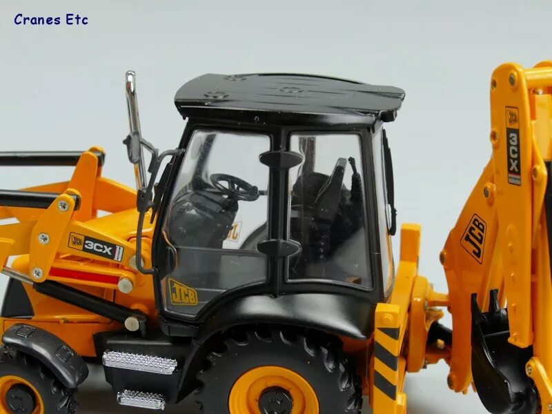 Модели jcb. Модель трактора jcb 3cx. jsb экскаватор 3cx. jcb 3cx 1:50. motorart 1:50 jcb 3cx.