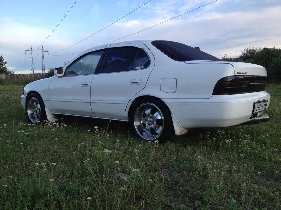 Тойота спринтер ае100 купить. Toyota Sprinter 100. Toyota Sprinter ae100. Toyota Sprinter 100 кузов. Спринтер ае100.