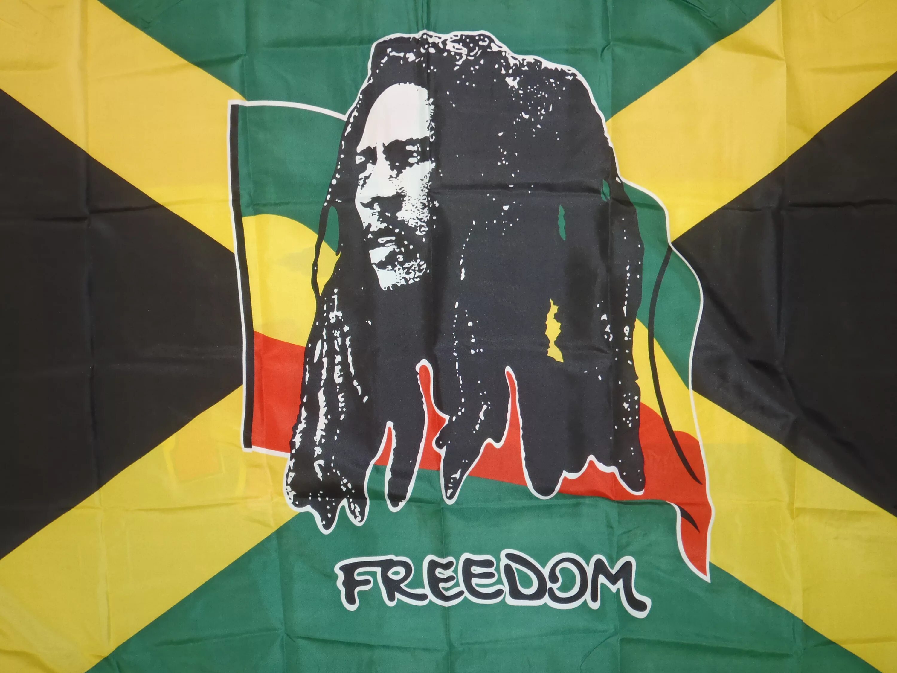 Растаманский флаг Боб Марли. Ямайка регги Боб Марли. Флаг Ямайки Боб Марли. Флаг растафари. Кто такой растафарай