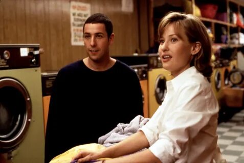Adam Sandler and Joey Lauren Adams at the laundromat. 