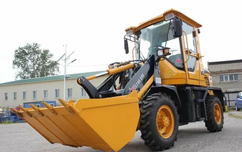 Авито фронтальный погрузчик новый. Фронтальный погрузчик xcmg lw300f. Погрузчик 933 xcmg. Zl 20 фронтальный погрузчик. Фронтальный погрузчик звезда zl20.