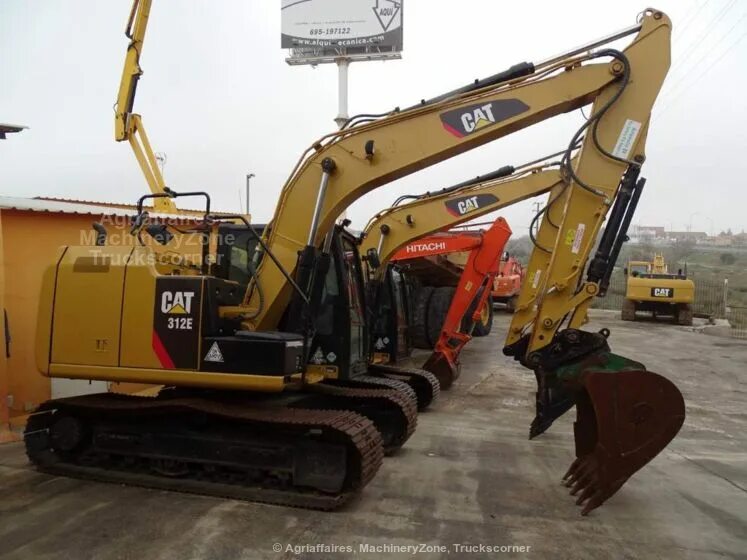 Экскаватор Cat 312e. Caterpillar 312. Caterpillar m324d2 MH экскаватор. Экскаватор Cat 312 габариты.