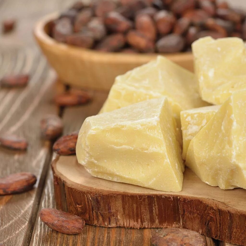 Масло фото. Масло какао (баттер). Cacao Butter масло. Какао масло нерафинированное. Какао масло фото.