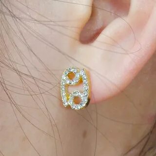 Сережки знаки