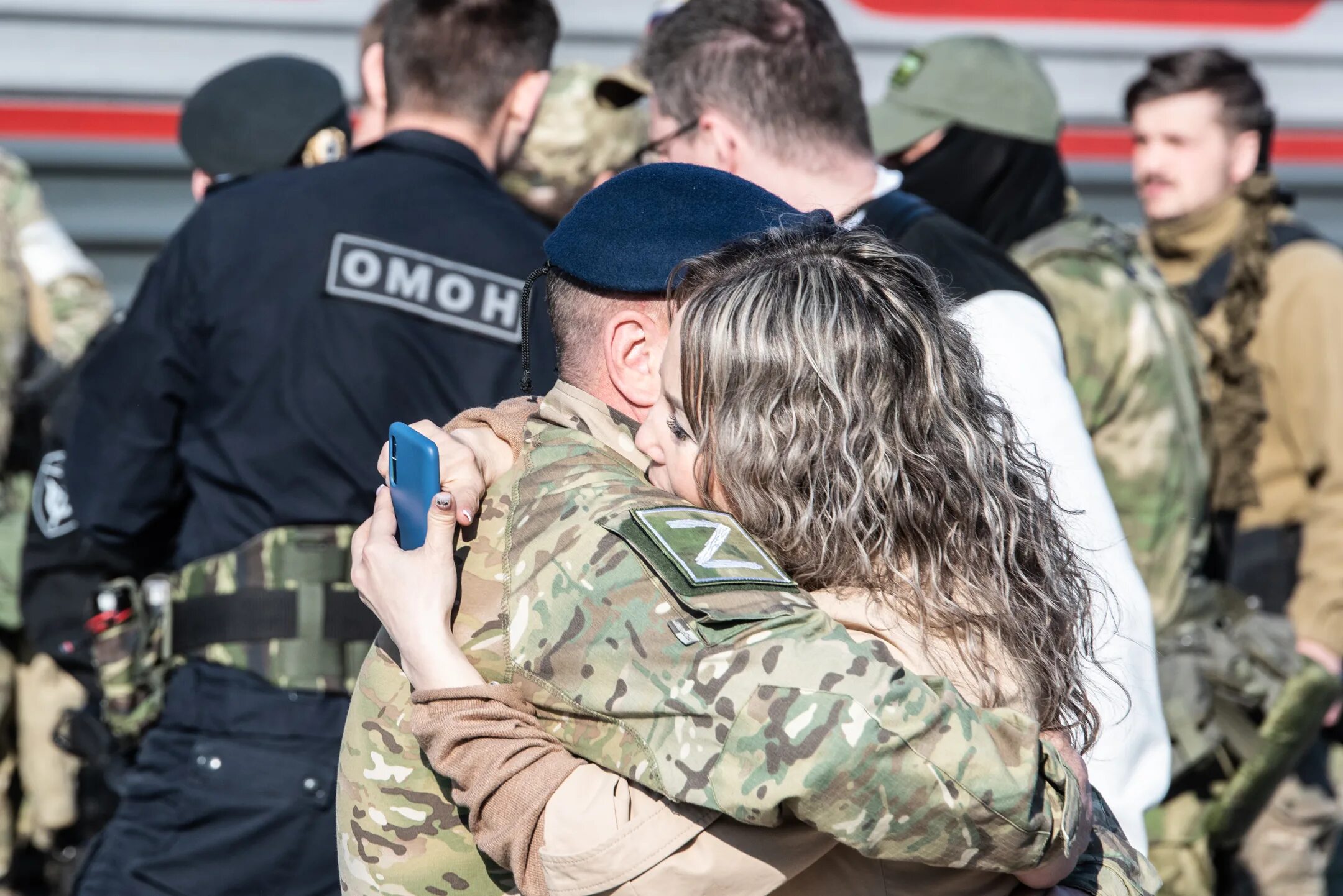 Праздник специальной военной операции. Отряд военных. Встреча военных. Военные события. Встреча военных с Украины.