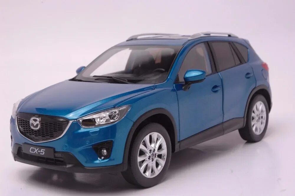 Mazda CX-5 1:18. Моделька Mazda CX-5. Welly Mazda CX-5. Mazda CX-5 игрушка. Mazda машинки