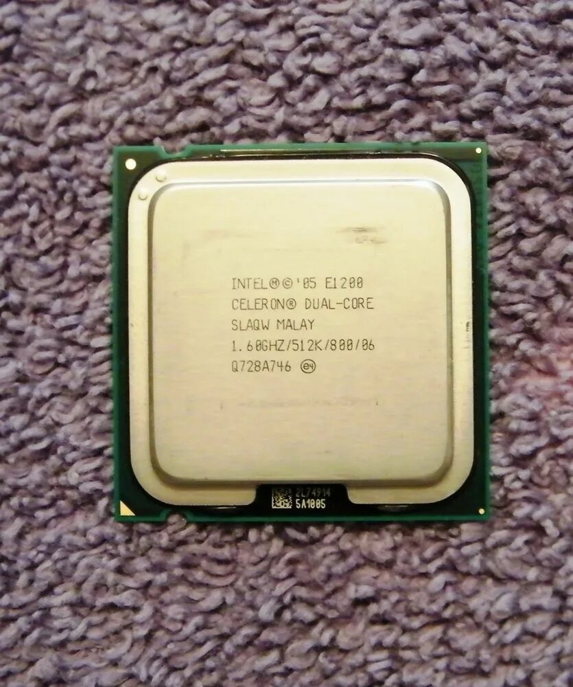 Intel celeron dual. Intel dual core e1-1200. процессор celeron e1200. celeron dual-core e1200. celeron e1200 сокет.