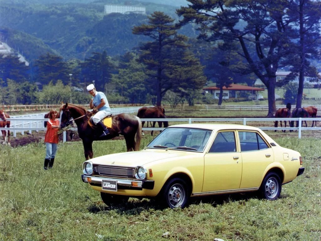 Лансер 1 поколение. Mitsubishi lancer 1973. Mitsubishi lancer evolution 1 1992. Mitsubishi lancer 1. Митсубиси лансер 1973.