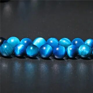 Синий тигровый глаз камень