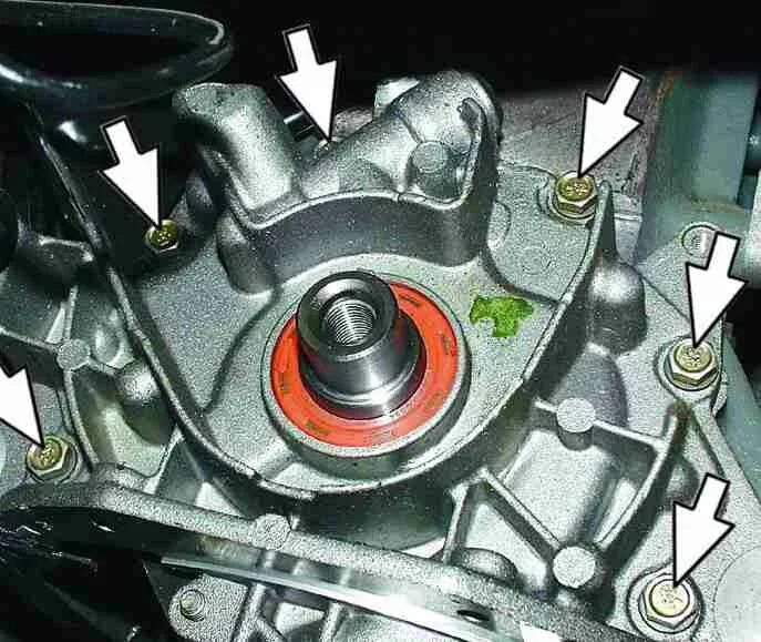 Removing and installing the front cover in a Mercedes-Benz W203 diesel engine