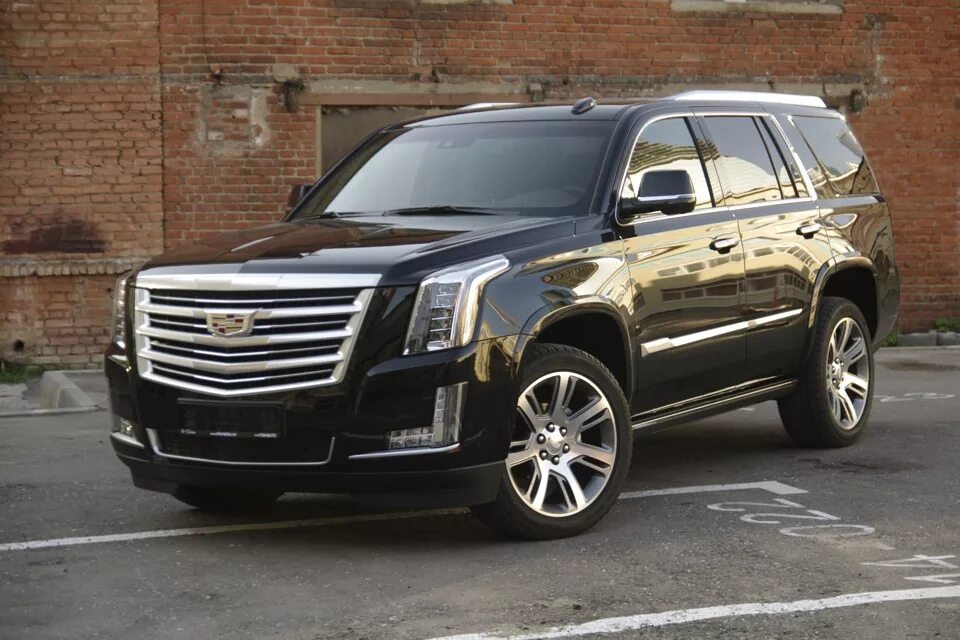 Cadillac escalade 4g. Кадиллак 4 поколения. Кадиллак эскалейд 2014 черный. Cadillac escalade 4 поколение внедорожник. Кадиллак эскалейд 4 поколения.