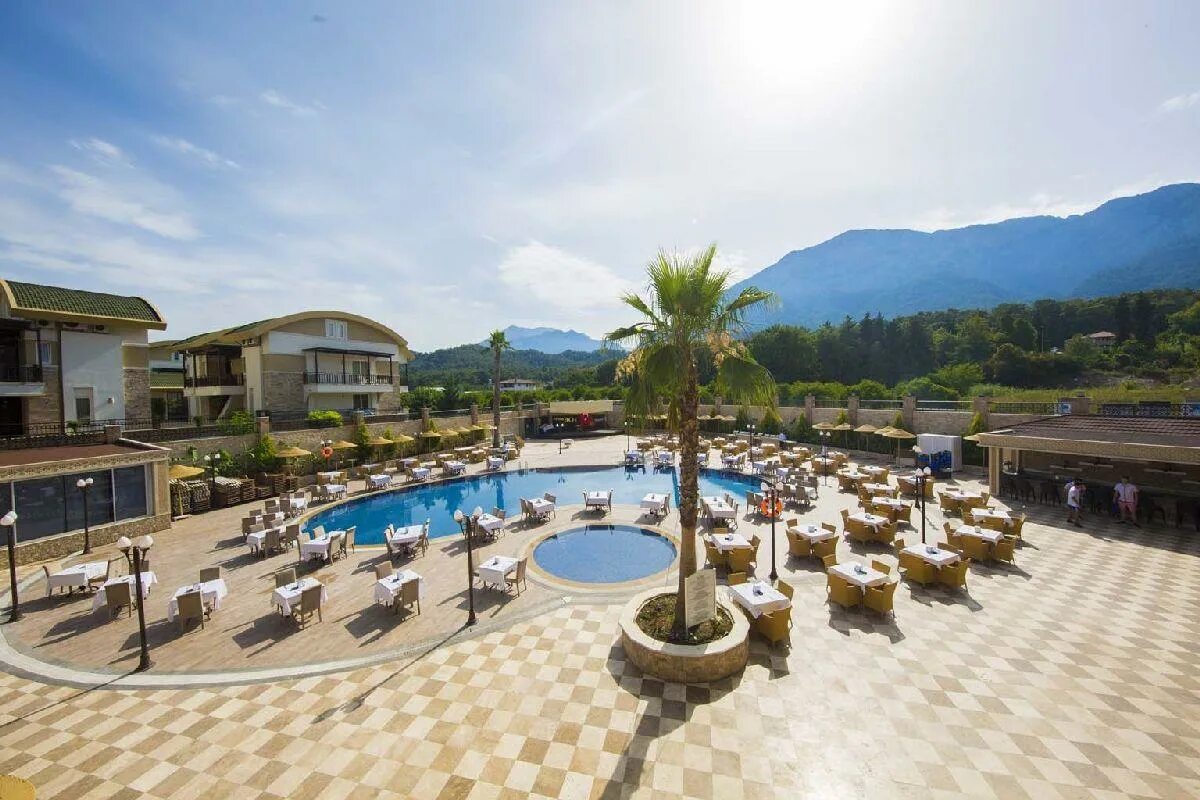 Belenli resort hotel 4. Elamir Resort Hotel (ex. Kemer botanik Resort) 4*. Кемер Турция отель ботаник Резорт. Кемер отель ботаник 5*. Elamir Resort Hotel 4 Кемер.