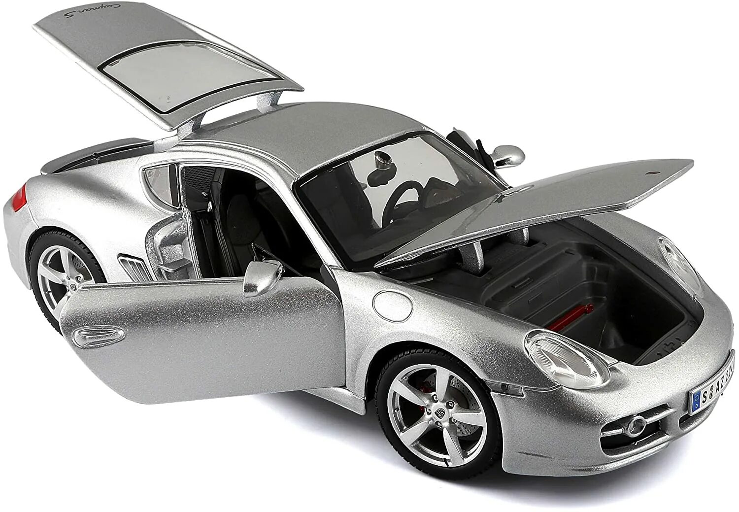 Porsche 1/18 maisto. Модель машины Welly 1:18 Porsche Cayman. Модель авто Порше Панамера масштаб 1:18. Машинка Porsche Cayman s.