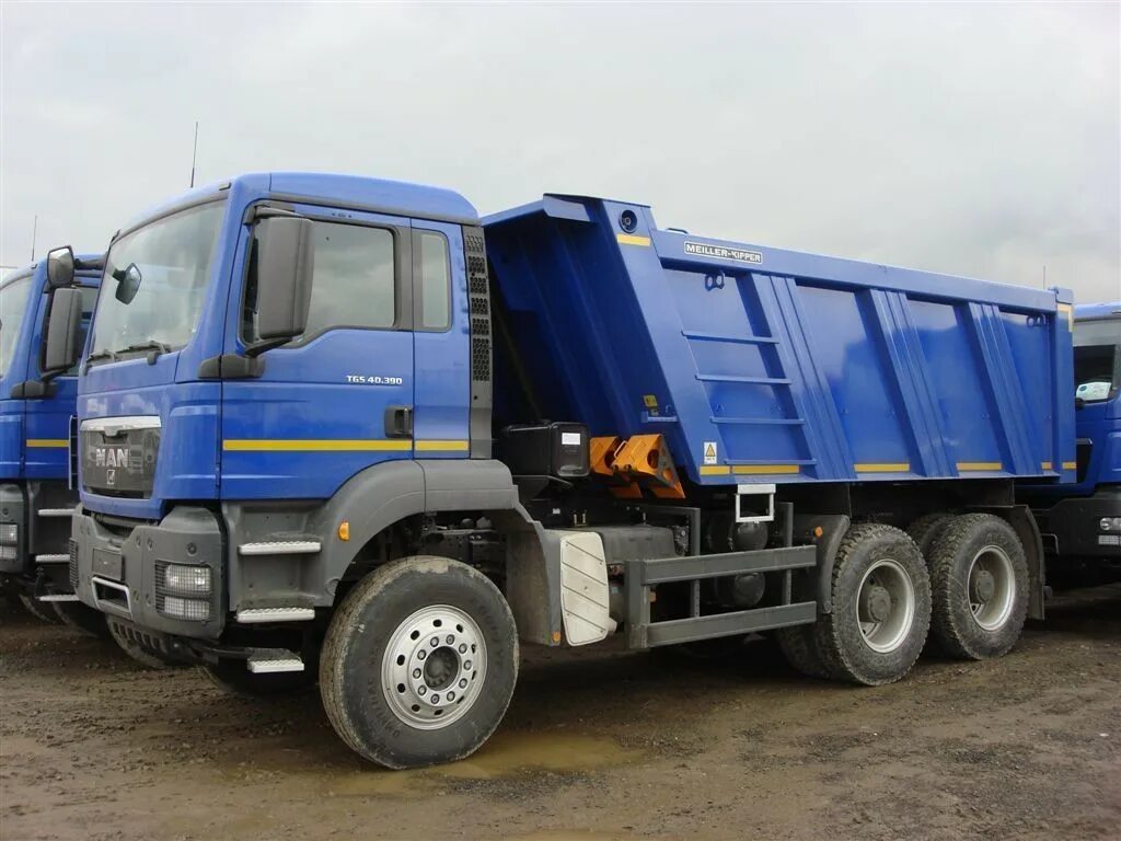 Самосвалы всей россии бу. Ман ТГС 40.390. Ман ТГС 6х4 самосвал. Man TGS 40. Man TGS 6x4 самосвал.