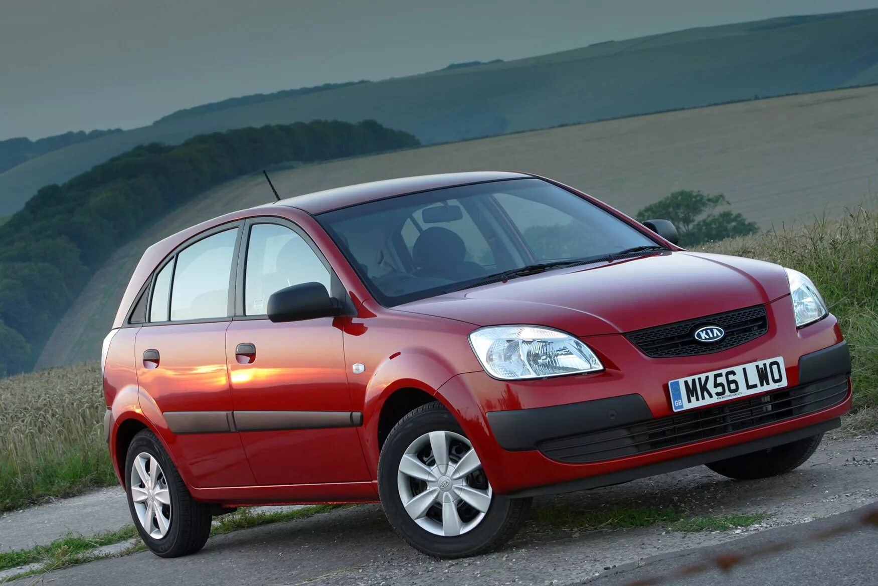 Kia Rio II хэтчбек (2005-2011). Kia Rio 2. Kia Rio II хэтчбек 2009. Kia Rio 2005 хэтчбек.