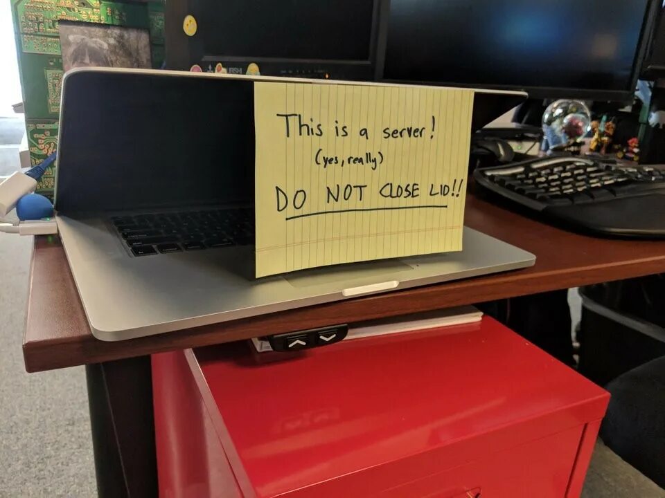 Server that s all we know. У нас серьезная компания. what is it it&#039;s a laptop. is this his desk?. this is server do not close.