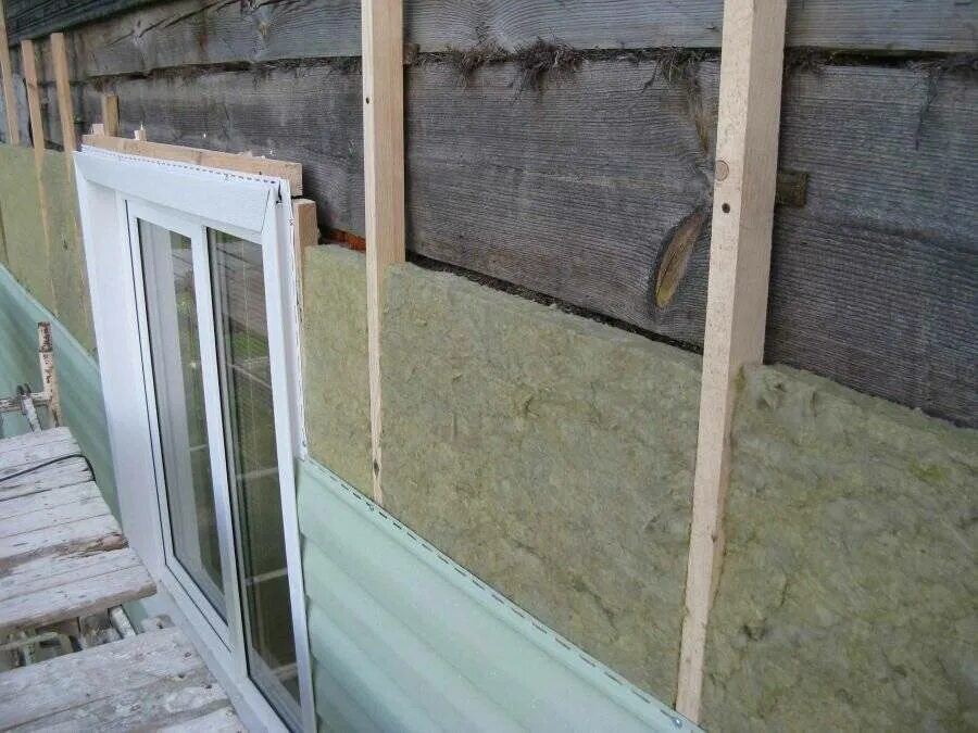 Как делать сайдинг. Обрешетка под сайдинг с утеплителем rockwool. обрешетка стен под сайдинг. обрешетка для сайдинга. каркас для сайдинга с утеплителем.