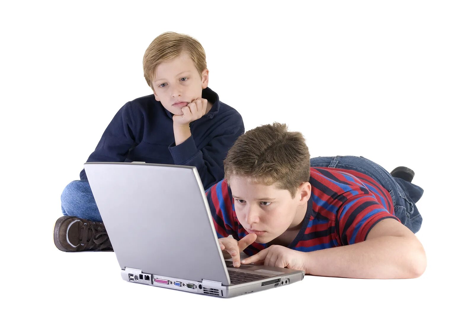The boy is playing the computer