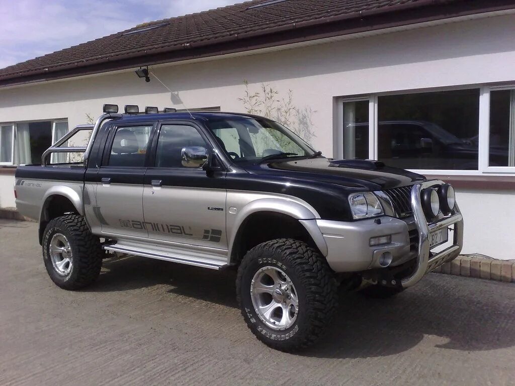 Mitsubishi l200 3 поколение. Мицубиси л200 2004. Mitsubishi l200 Magnum.