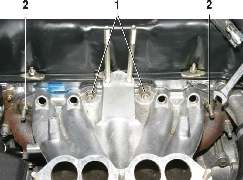 Крепеж впускного коллектора ВАЗ 2114. Впускной и выпускной коллектор ВАЗ 2106. Впускной коллектор ВАЗ 2107 инжектор. Коллекторы ВАЗ 2114 на головке. Снятие коллектора ваз