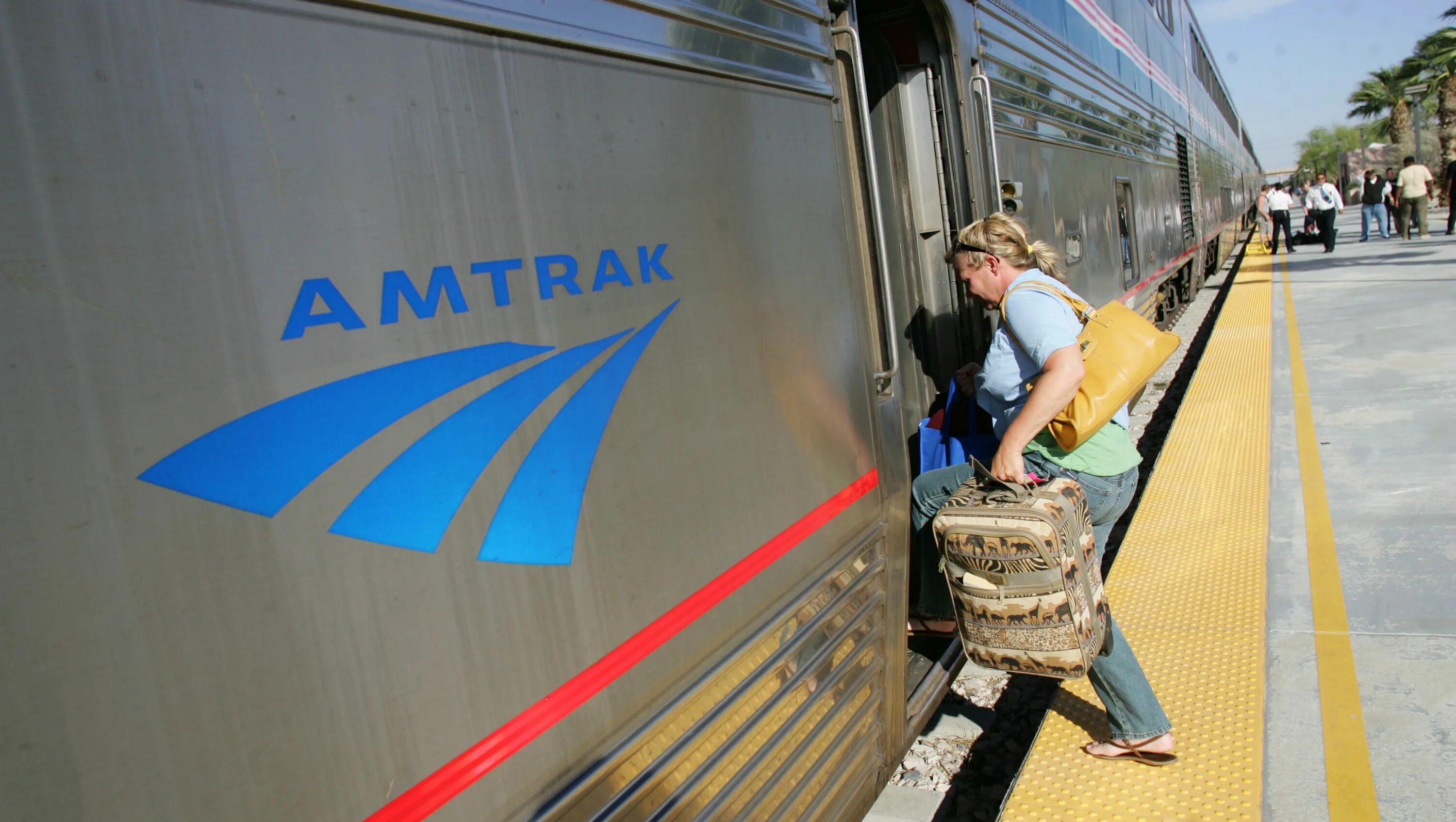 Take a Train. Get on the Train. Get a Train. People getting on a Train. To get on a train