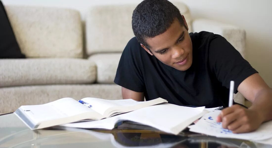 He is studying english. Читает бумаги злой. читает по бумаге. studying man. man studying english.