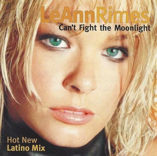 Can t fight the moonlight leann. Leann Rimes обложки с альбомов. Leann Rimes Spitfire обложка. Can't Fight the Moonlight Лиэнн Раймс текст. Cant Fight the Moonlight песня из рекламы.