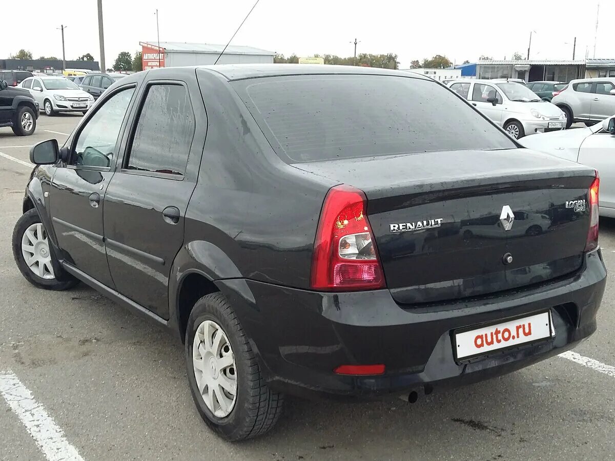 Купить рено логан с пробегом в спб. Рено Логан 1.4 черный. Renault Logan 2010 черный. Рено Логан 1.4 2010 года. Renault Logan 2004 1.4 MT back.