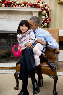 Barack Obama snuggles with his niece Savita Ng.jpg. 