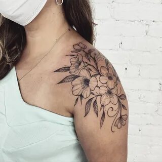 Botanical Shoulder And Arm Tattoo For Women. 