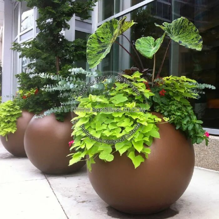 Fiberglass Flower Pot. Fiberglass ornamental flowerpot. Outdoor flowerpots, Pots. Potted Plants in outside. Globe plants