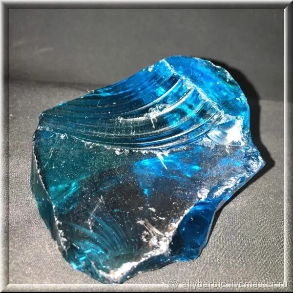 Вулканический камень обсидиан. Вулканическое стекло обсидиан. Голубой обсидиан камень. Камень обсидиан синий. Синий обсидиан