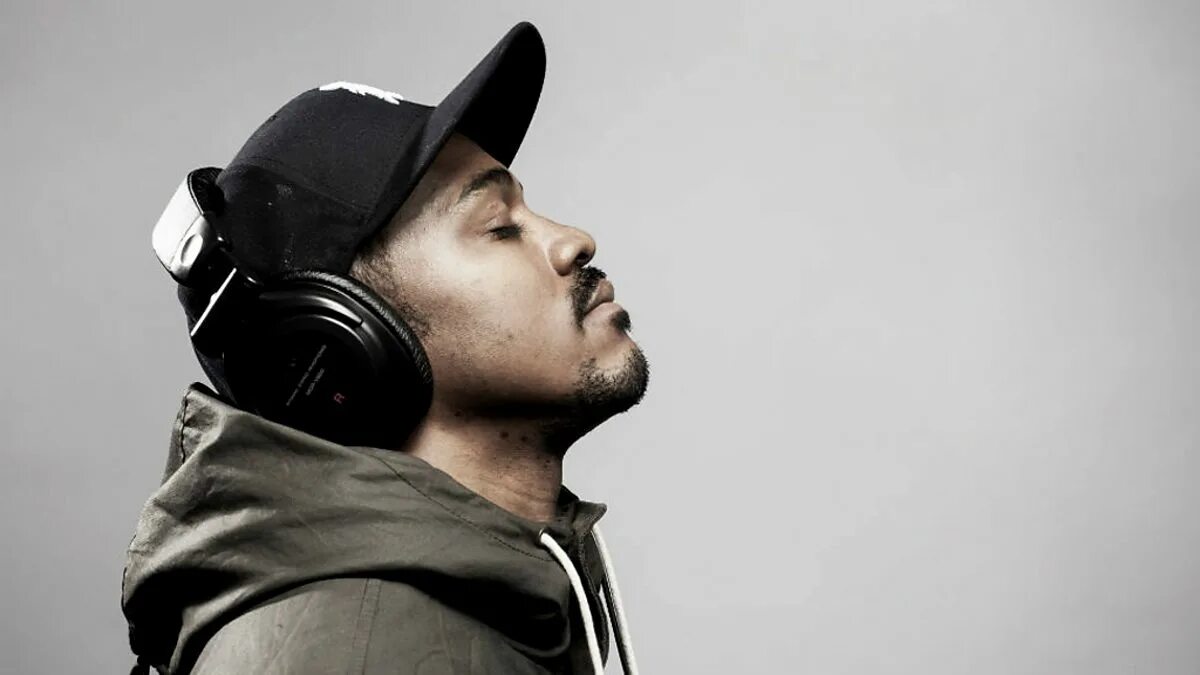 He likes music. Black guy streamer. ear to music. guy is listening to music at night picture. black guy listening to music meme.
